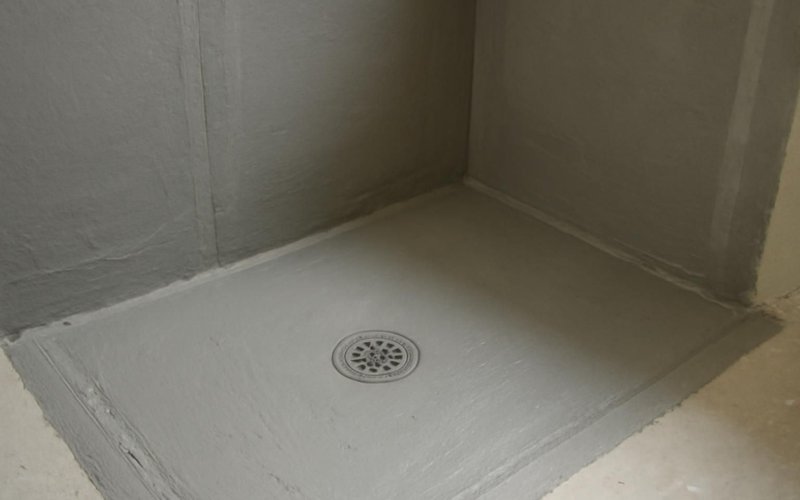 AI concept: Waterproof membrane applied inside a shower before tile
