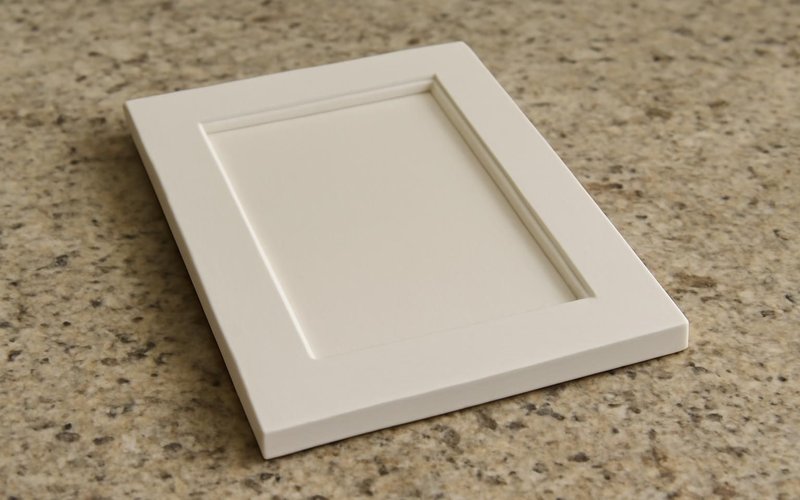 Rigid thermofoil door in matte white