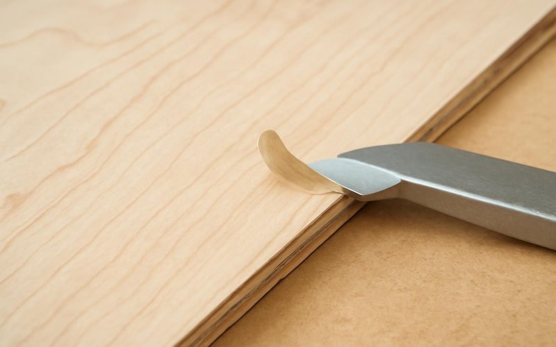 AI concept: Maple wood veneer sheet being trimmed