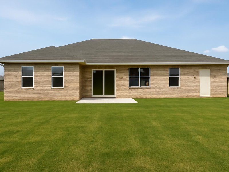 AI concept: Existing condition: bare lawn behind a ranch house
