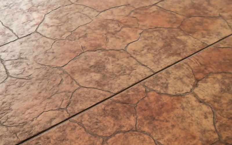 AI concept: Colored concrete with an antiqued release pattern