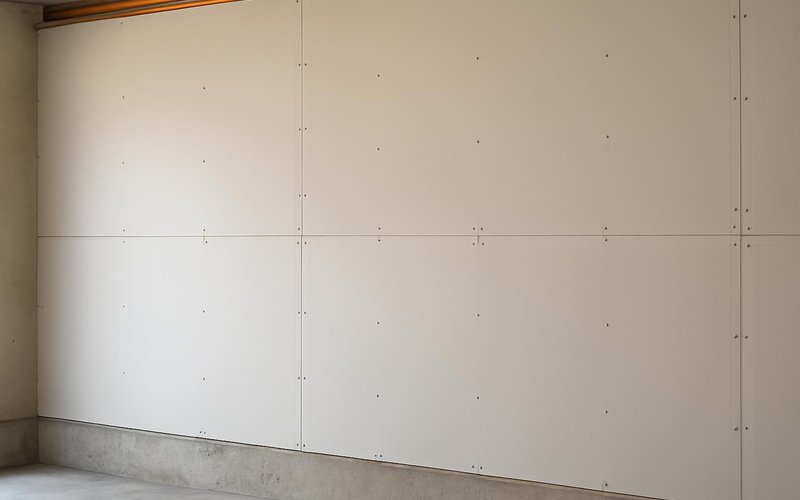 AI concept: Fire-rated drywall on a garage wall
