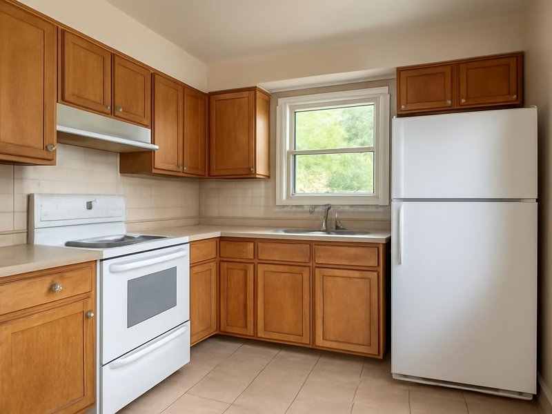 AI concept: Existing condition: small U-shaped kitchen with worn cabinets
