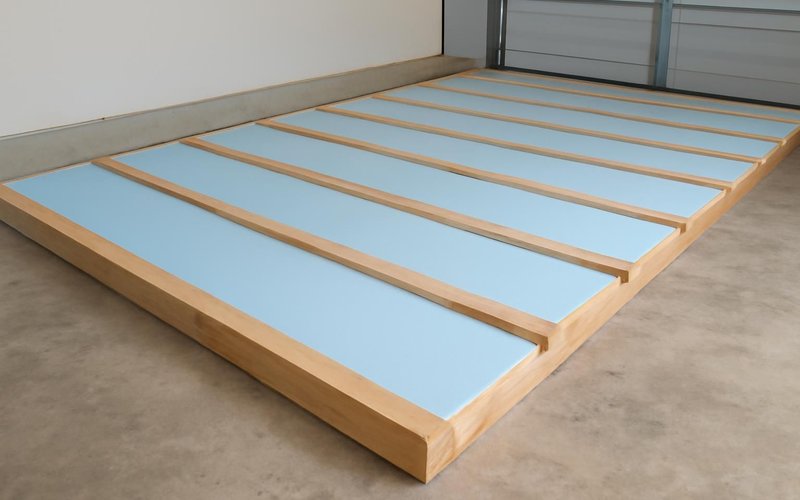 AI concept: Rigid foam and sleepers raising a garage floor
