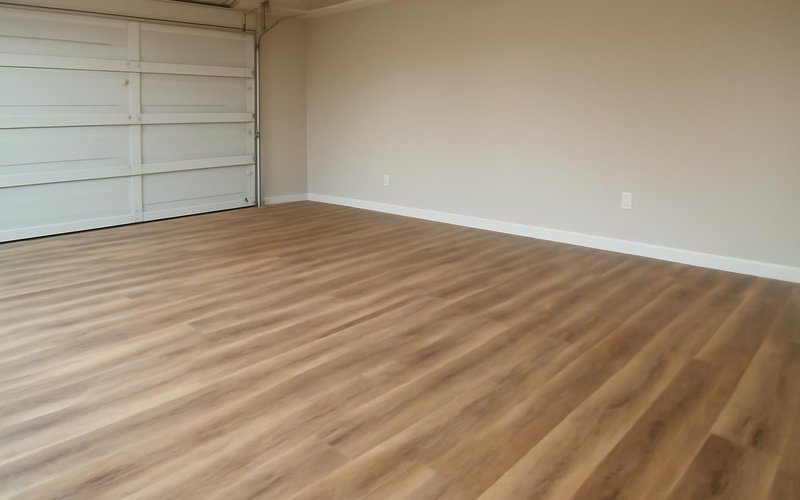 AI concept: Luxury vinyl plank in a converted garage room