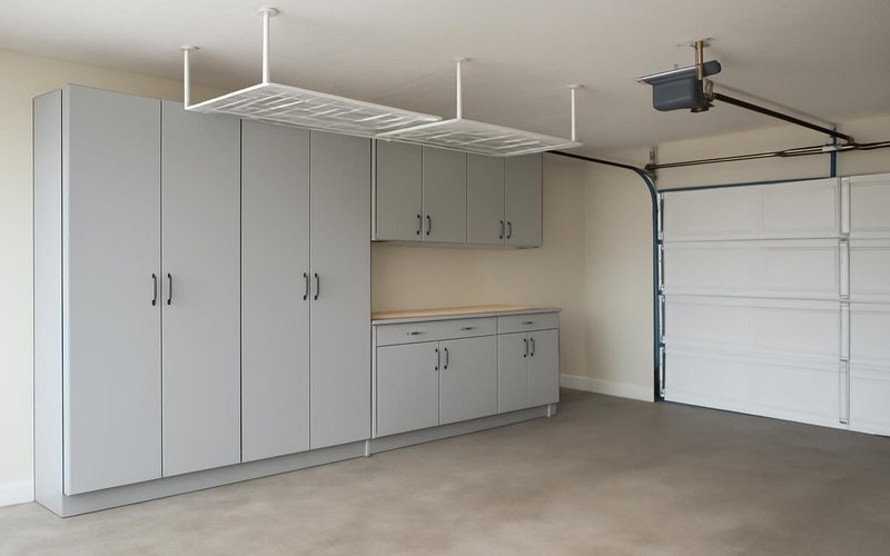 AI concept: Finished garage with cabinets and ceiling racks