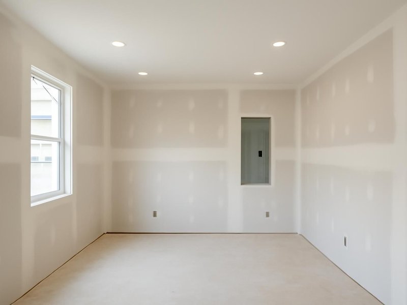 AI concept: Remodeled idea: rooms with new drywall, recessed lights and a new electrical panel