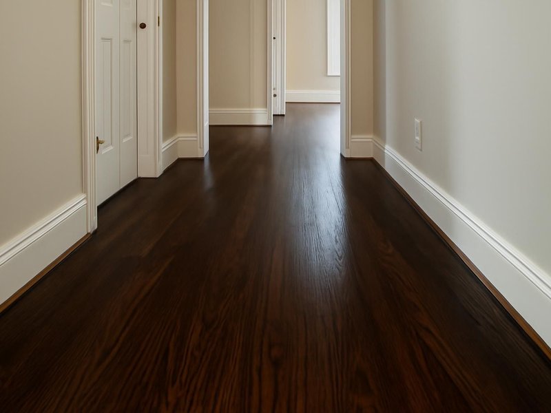 AI concept: Existing condition: dark espresso stain worn gray in the hallway