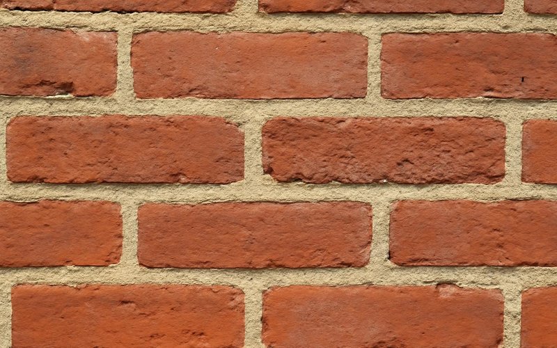 AI concept: Lime mortar joints in an older brick wall