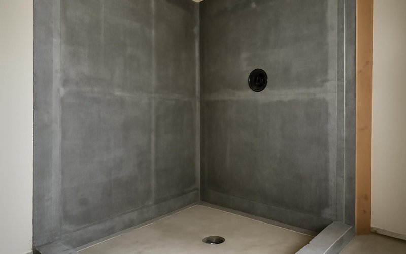 Waterproof membrane on shower walls before tile