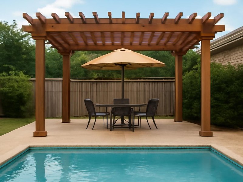 Before: pool patio with a faded umbrella