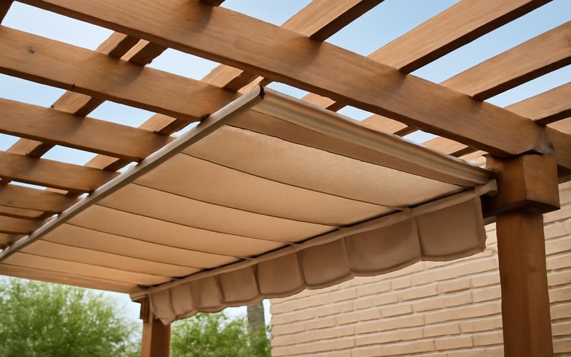 Retractable fabric canopy under a wood pergola