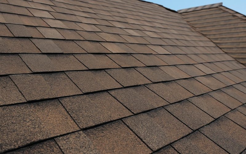 Architectural asphalt shingles on a pitched roof