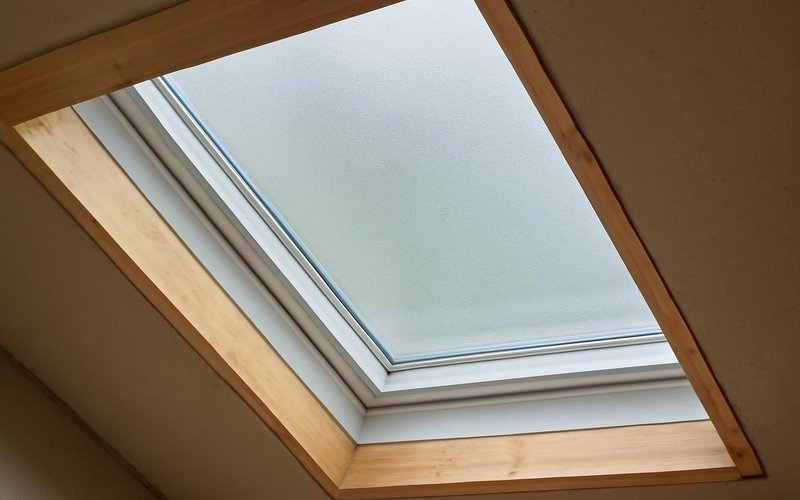 Laminated low-E glass in a skylight frame