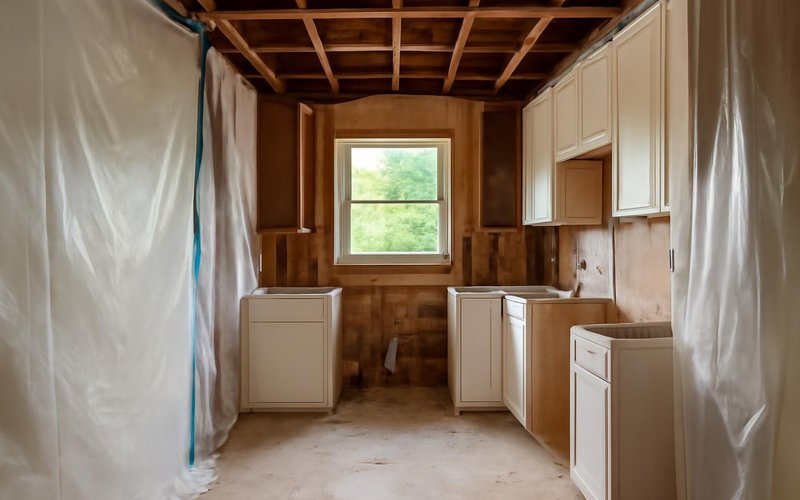 AI concept: Kitchen demolition with dust barriers in place