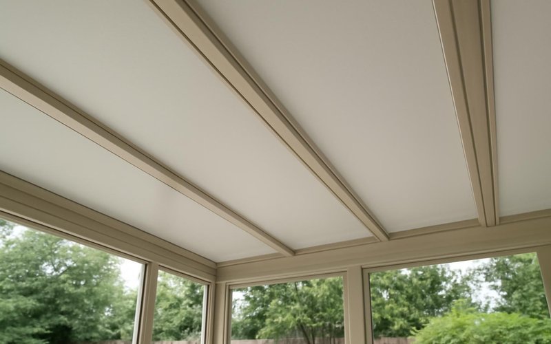 Insulated roof panels on a sunroom addition