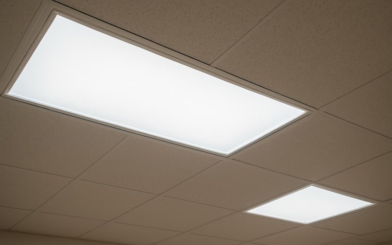 AI concept: LED troffer lights in an office ceiling