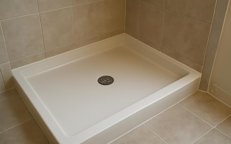 AI concept: Molded shower base sized for a tub alcove