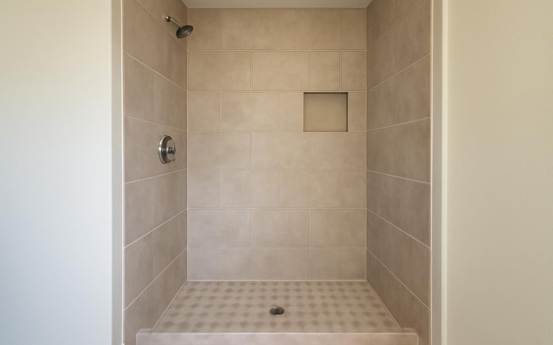AI concept: Finished tiled shower in the old tub alcove