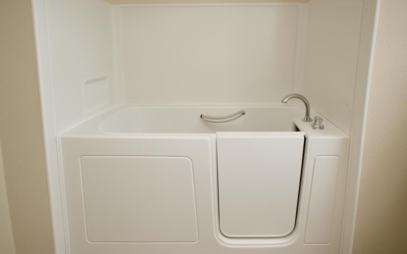 AI concept: Acrylic wall surround around a walk-in tub