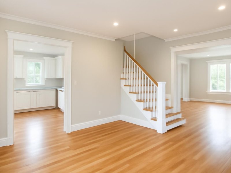 After: painted trim, brighter lighting and one continuous floor downstairs