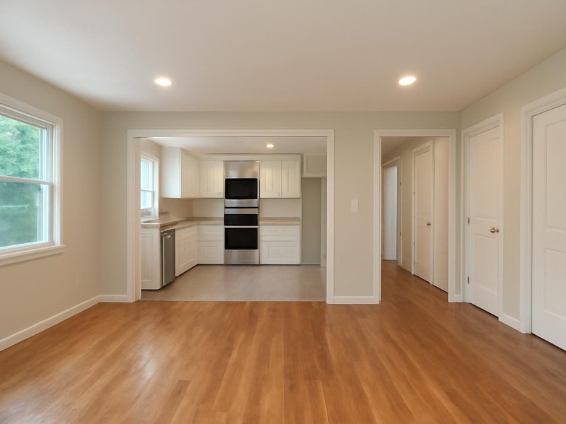 Before: ranch with a closed kitchen and small rooms